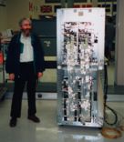 Norm Jaffe besides an HP X-series cabinet